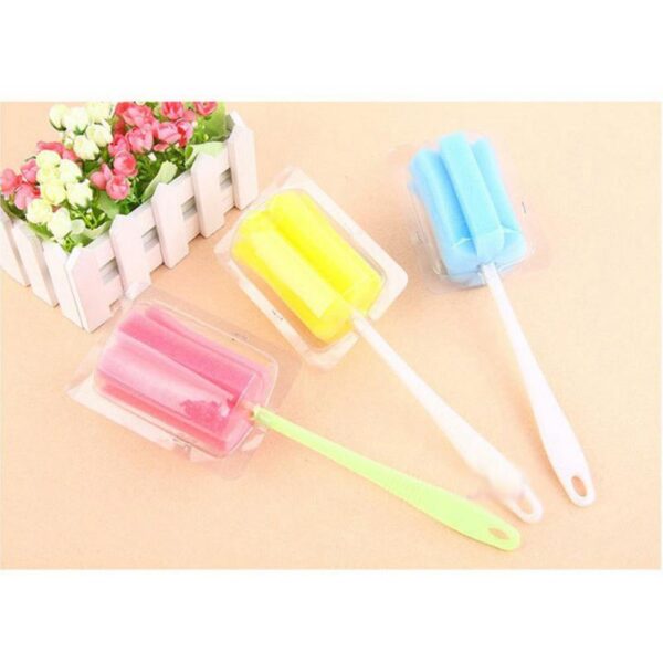 Esponja con escobilla para limpieza de biberones varios colores