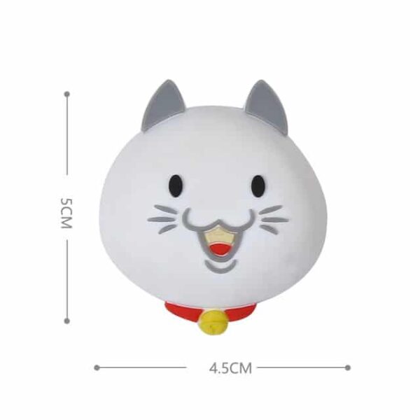 Tope de puerta antipilladedos muñeco gato color blanco